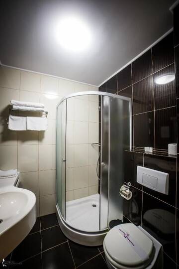 Фото номера Двухместный номер с 1 кроватью Отель Hotel Ozana г. Бистрица 12