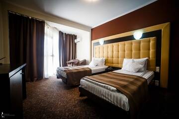 Фото номера Двухместный номер с 2 отдельными кроватями Отель Hotel Ozana г. Бистрица 6