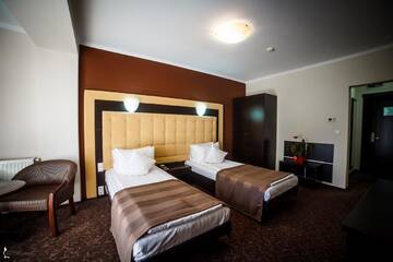 Фото номера Двухместный номер с 2 отдельными кроватями Отель Hotel Ozana г. Бистрица 3