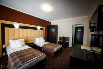 Фото номера Двухместный номер с 2 отдельными кроватями Отель Hotel Ozana г. Бистрица 4